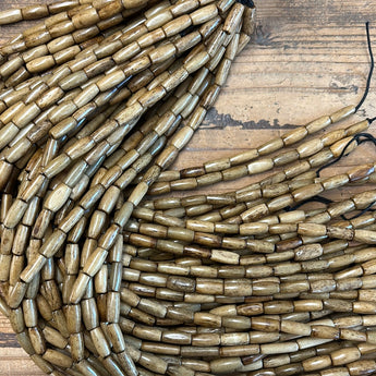 Tan Wood Tubes Strand- about 1/2”